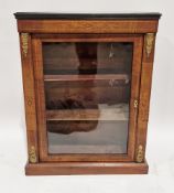 Victorian inlaid walnut pier cabinet with ormolu mounts, the single glazed door opening to two