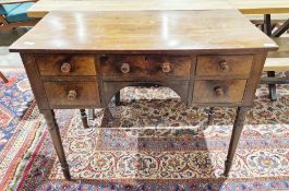 19th century mahogany side table, the rectangular top over an arrangement of five drawers
