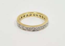Yellow metal and diamond eternity ring, stamped 50, size I, 2.9 grams gross