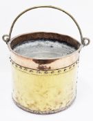 19th century brass and copper studded bucket with swing handle, 20cm high x 24cm diameter