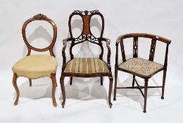 Three chairs including a mahogany string inlaid corner chair on turned tapering legs united by a