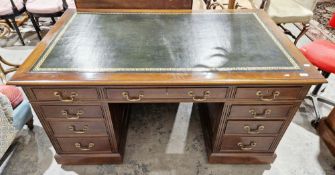 Late 19th/early 20th century mahogany twin pedestal desk, the rectangular top with black leather