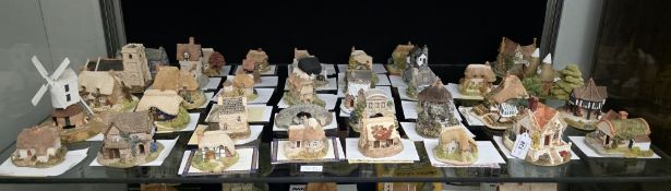 40 Lilliput Lane model cottages including 'Clockmakers Cottage', 'Gardeners Cottage', 'Flower