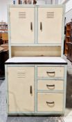 Mid-20th century enamelled metal kitchen larder cupboard, the upper section with two panelled