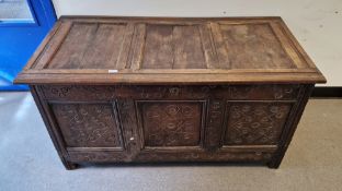 18th/19th century oak coffer, the three-panel hinged lid opening to an empty space, the three-