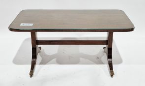 20th century mahogany coffee table in the regency manner, the rectangular top with rounded corners