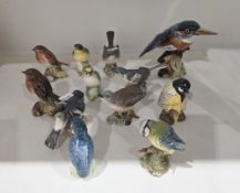 Collection of Beswick pottery models of birds including a white throat bluetit, a goldcrest, robins,