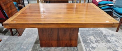 A contemporary walnut and burr walnut veneer extending dining table by Elite Interiors of Montreal