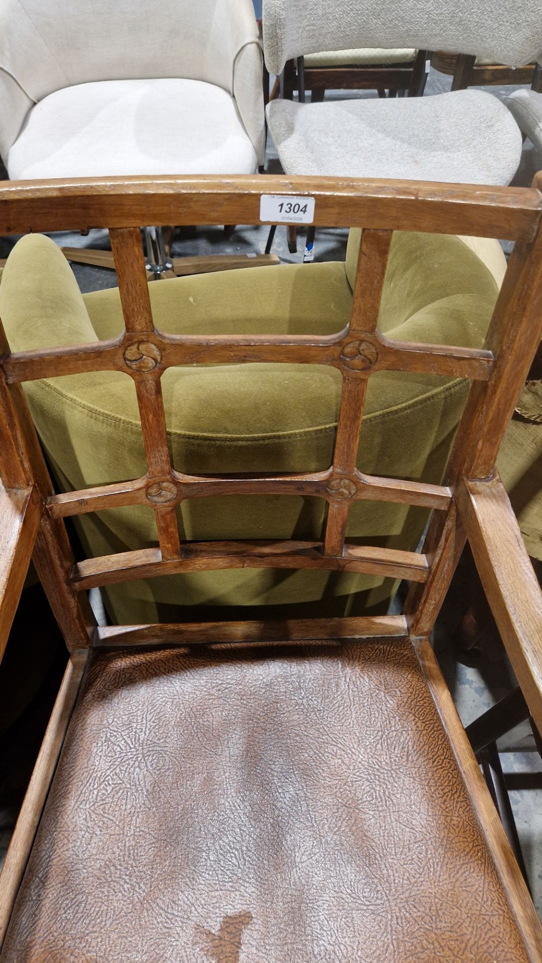 In the manner of the Cotswold School an Arts and Crafts pale oak elbow chair with lattice back, - Image 2 of 14