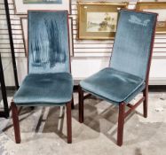 A set of six rosewood veneer dining chairs with green upholstered backs, seats and seat pads on