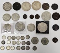 Collection of coins including an 1821 silver crown, an antique Arabic/Persian hammered coin, an 1806