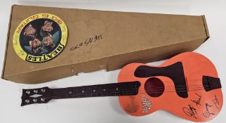 1960's Selcol The Beatles Big 6 plastic toy guitar, constructed in a red, orange and burgundy