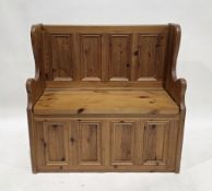 Modern pine settle type hall bench with panelled back and front panels and hinged lift-up seat, 90cm