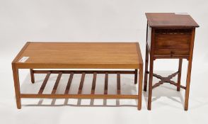 Mid-century teak coffee table of rectangular form, on square tapering legs united by a slatted