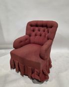 19th century-style armchair upholstered in a red button back fabric, on turned tapering front legs