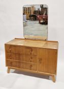 Mid-century Meredew light oak dressing chest comprising a rectangular mirror over three long drawers