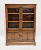 Ercol Mural Elm Golden Dawn bookcase display cabinet comprising bevelled glazed doors opening to two