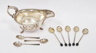 Five silver coffee spoons with black bean finials, Birmingham 1957, three silver egg spoons and a