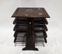 Anglo-Indian hardwood magazine table in the style of Edward Wormley, the rectangular top with carved
