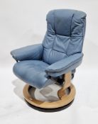Ekornes Stressless recliner armchair upholstered in blue leather, on pale oak veneer circular swivel