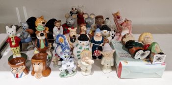 Group of Wade bone china character figures including Yogi Bear, Mr Jinx, Rupert no.2, The City Gent,