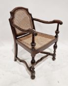 Stained beech wood elbow chair in the 17th century Carolean manner with caned back panel and seat,