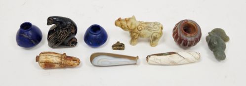 Conch shell pendant, probably Indian Dinganpara, a carved hardstone model of a rhino, a carved black