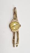 Early 20th century 9ct gold lady's wristwatch, the dial with arabic numerals, the case back