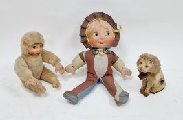 Three vintage toys including a mechanical wind-up roaring lion 13cm high, Norah Wellings style cloth