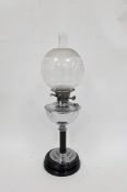 Early 20th century oil lamp comprising an etched globular shade on a chrome well with black