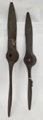 Two Royal Aircraft Establishment brown carbon fibre propellers, one with metal core stamped RAE T.