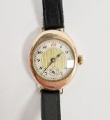 Early 20th century 9ct gold cased lady's wristwatch of oval form, the silvered and gilt dial with