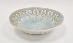 Margaret Shotton studio porcelain bowl with pieced rim decoration and blue crystalline glaze, 29cm
