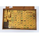 Mid century mah-jong set comprising approximately 152 butterscotch bakelite tiles, fitted in its