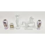 Rosenthal white porcelain figure of a standing scantilly draped maiden modelled by Berthold Boehs,