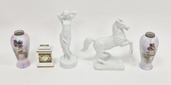 Rosenthal white porcelain figure of a standing scantilly draped maiden modelled by Berthold Boehs,
