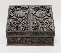 Anglo-Indian hardwood stationery cabinet, profusely carved throughout with flowers and foliage,