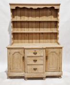 19th century pine dresser, the upper section with two plate shelves, the lower section of breakfront