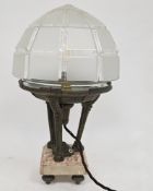 Early 20th century Art Deco table lamp, the geometric moulded clear and opaque domed glass shade