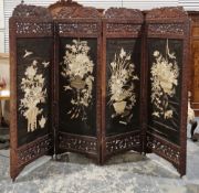 Early 20th century Asian hardwood four fold dressing screen, pierced frame carved with birds amongst