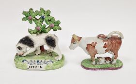 Staffordshire pearlware model of a setter, circa 1820, the black and white dog modelled standing