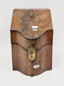 George III mahogany knife box, the front of serpentine form, the hinged lid opening to a fitted