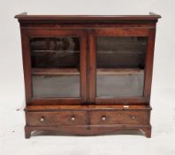 19th century mahogany table top cabinet, the two glazed doors opening to an adjustable shelf, over