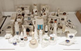 Collection of crested china models, printed factory marks, including: Longton China Hythe skull;