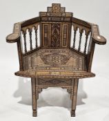 Syrian Damascus walnut and parquetry inlaid elbow chair, having a horseshoe shaped geometric back