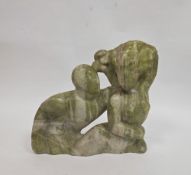 Contemporary mottled green soapstone carving of two naked intertwined figures, 35cm high x 38cm