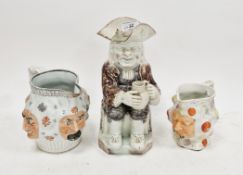 Staffordshire pearlware toby jug, early 19th century, speckled in brown and manganese on canted
