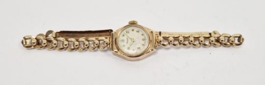 Lady's Rotary 9ct gold bracelet watch, the circular dial with number and heart markers on 9ct gold