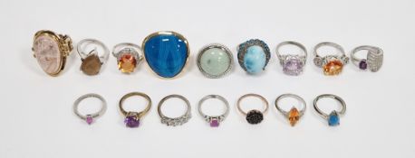 Collection of silver, white and gilt-metal dress rings, variously mounted with coloured stones, rose
