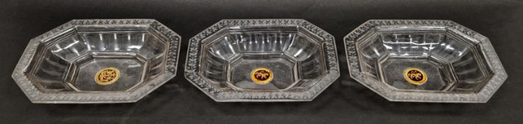 Three early 18th century Bohemian engraved, gilt and enamelled canted rectangular dishes, each